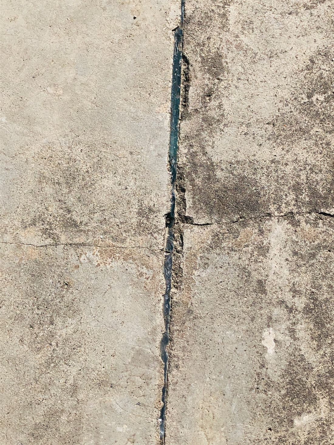 Crack running through a concrete foundation wall